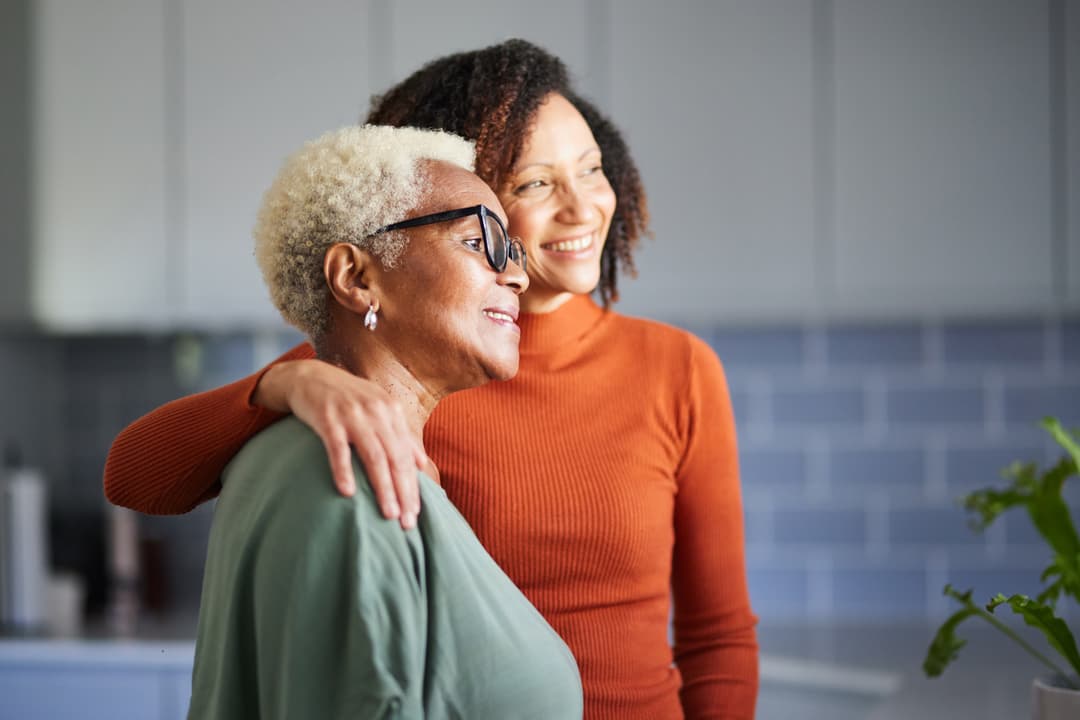 Hand on shoulder showing support